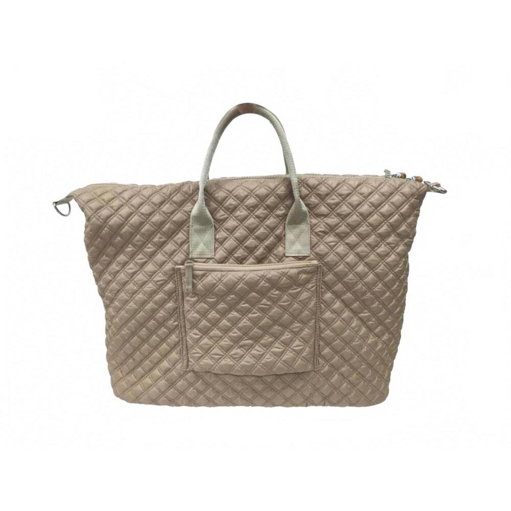 NEW TRVL DESIGN women's overpacker duffel bag in wheat